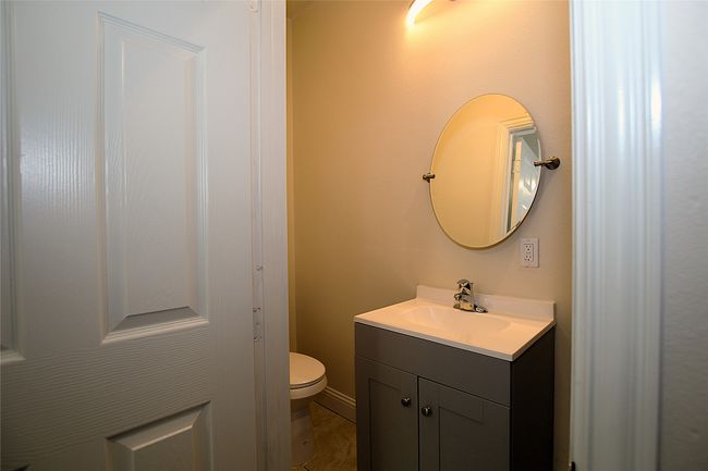 Bathroom with vanity and toilet | Image 6