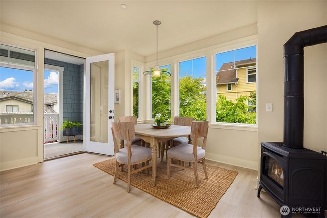 Dining area is south facing giving you tons of sunshine! | Image 10