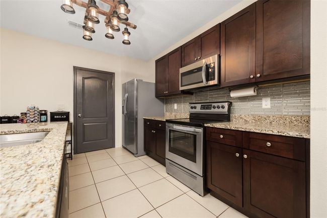 325 Briar Patch Loop, House other with 3 bedrooms, 2 bathrooms and null parking in DAVENPORT FL | Image 6