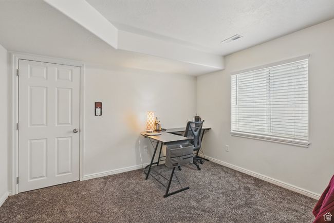 Carpeted office featuring visible vents and baseboards | Image 44