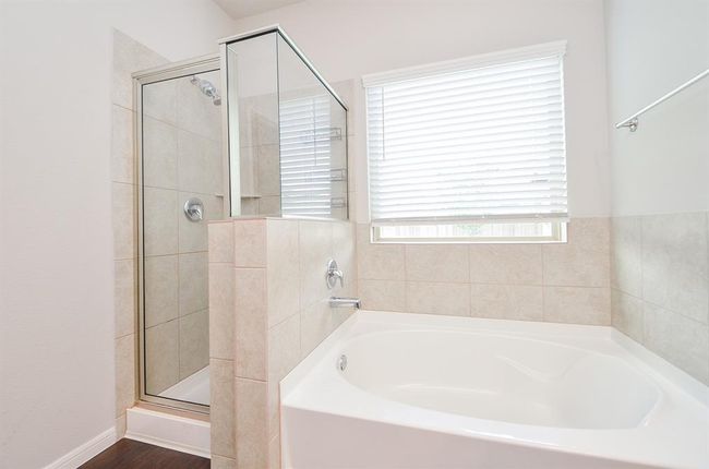 Choose a long lazy soak, or a quick refreshing shower after move in day comes to an end! | Image 16
