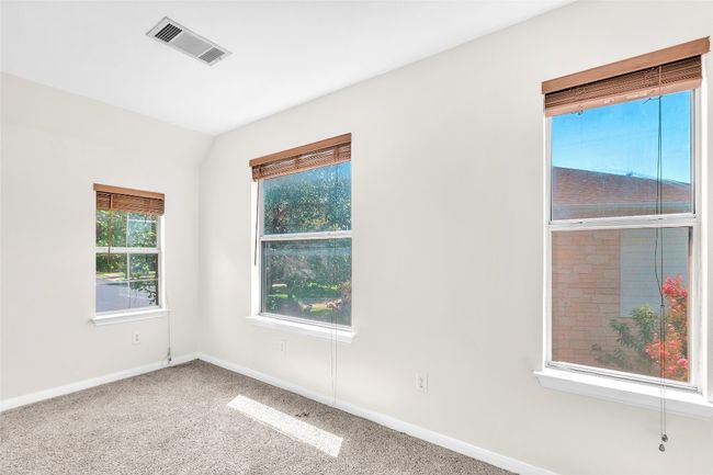 Carpeted empty room with baseboards | Image 23