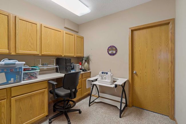 Bonus room in the lower level leads to additional storage. | Image 28