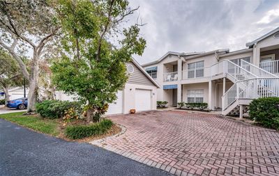 .. Phase Nine - Upper Floor Unit 1915 . 21 x 13 Garage is right next to the Tree.. Condo Conveys with Garage - Parking Pad & Guest Parking. | Image 1