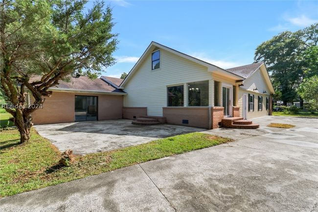 Rear view of house featuring a patio | Image 5