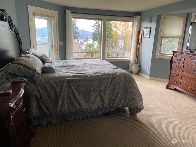 Primary bedroom with view and deck access | Image 30