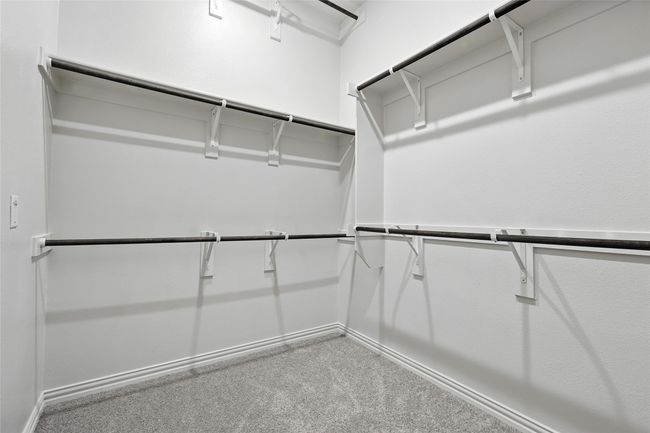 Spacious closet featuring carpet flooring | Image 26