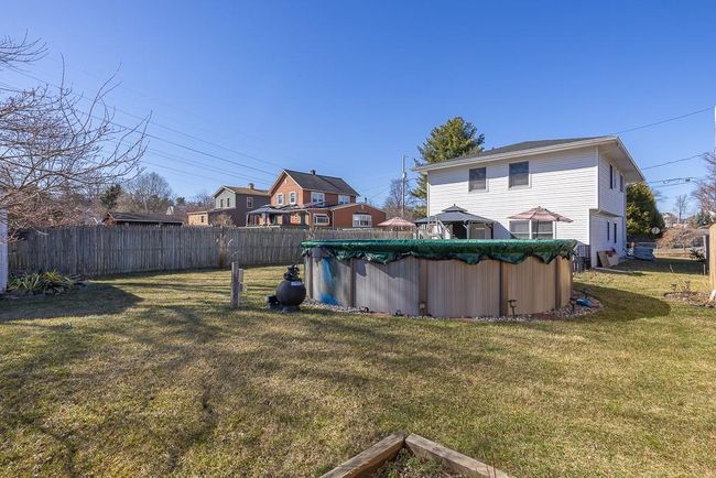 View of yard with fence and pool | Image 21