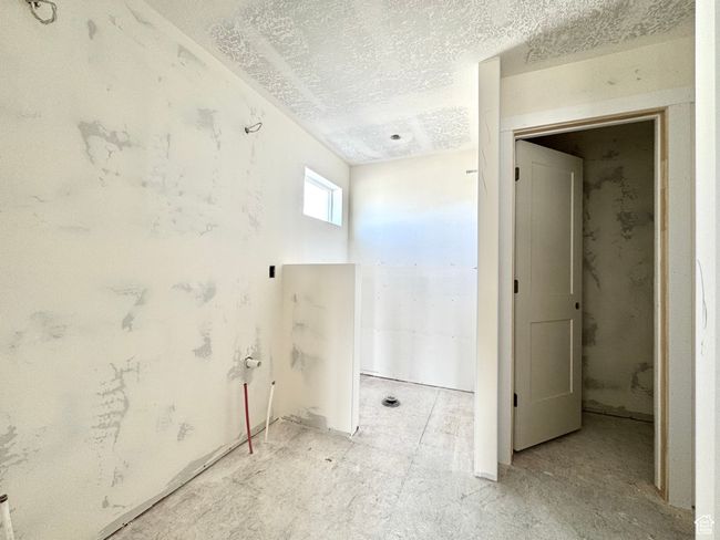 Bathroom with a textured ceiling | Image 19