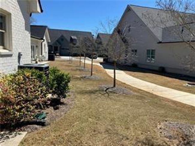 5099 Noble Village Way, Townhouse with 2 bedrooms, 2 bathrooms and null parking in Lilburn GA | Image 5