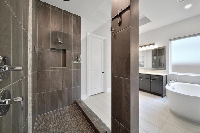 The large walk in shower. | Image 27
