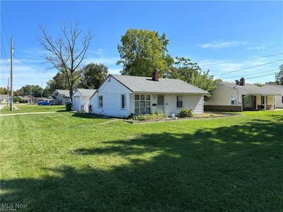 Back of property featuring a lawn | Image 2