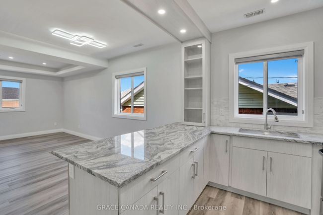 B - 1044 Howard Ave, Home with 2 bedrooms, 2 bathrooms and 1 parking in Windsor ON | Image 7