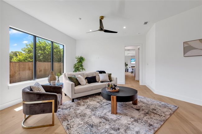 Living room with a ceiling fan, recessed lighting, and light wood-style floors | Image 14