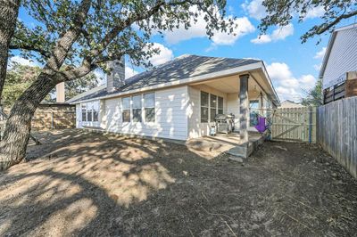 Rear view of house with a patio area | Image 2