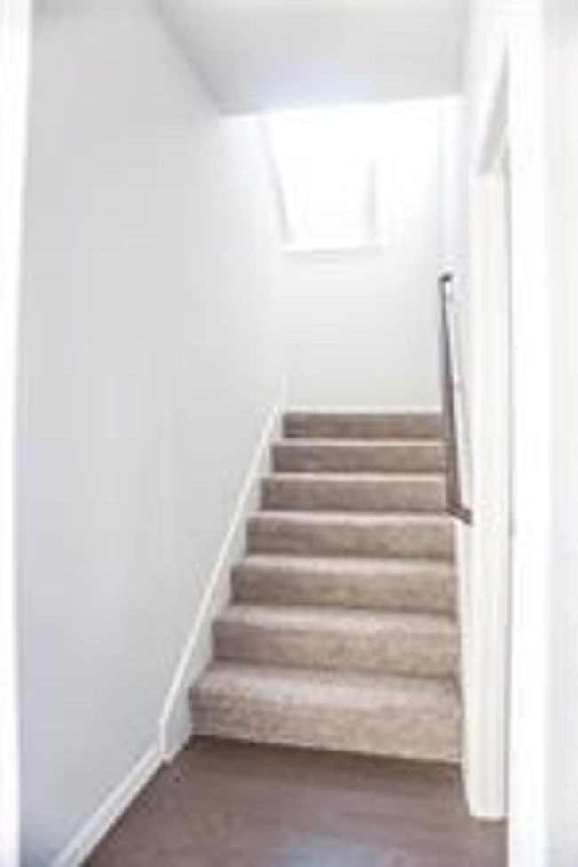 Stairs with baseboards | Image 8