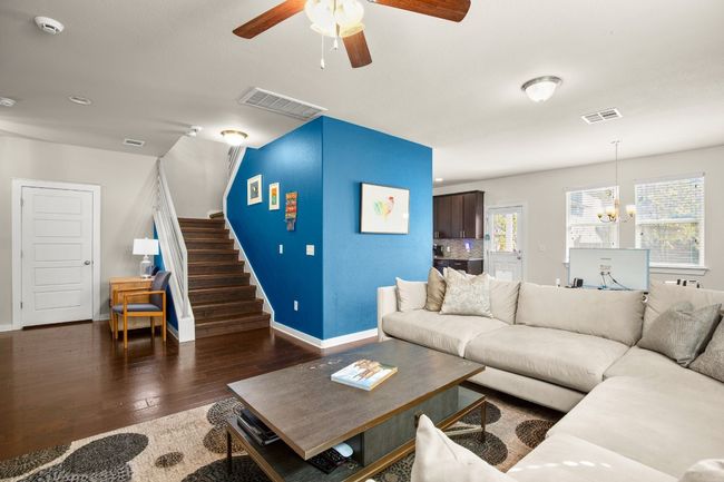 Seamless access to the kitchen makes this space perfect for entertaining. | Image 4