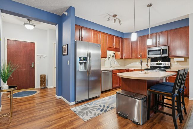 Stainless appliances and rich cabinetry! | Image 9