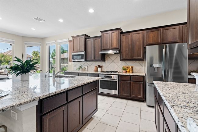 304 Tangerine Dr, House other with 4 bedrooms, 3 bathrooms and 4 parking in Buda TX | Image 12