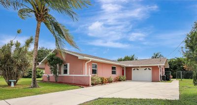 386 Nw Ferris Drive, House other with 3 bedrooms, 2 bathrooms and null parking in Port St. Lucie FL | Image 1