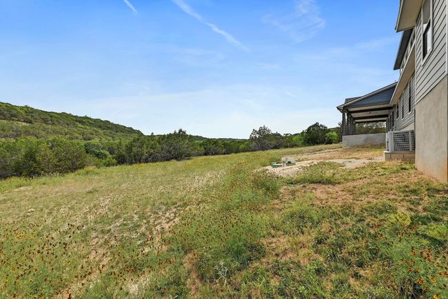 All the acreage provides plenty of space to create a custom outdoor oasis with room for a pool and so much more. | Image 39