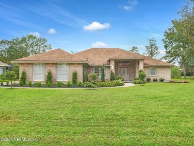 1806 Royal Fern Lane, House other with 4 bedrooms, 2 bathrooms and null parking in Fleming Island FL | Image 2