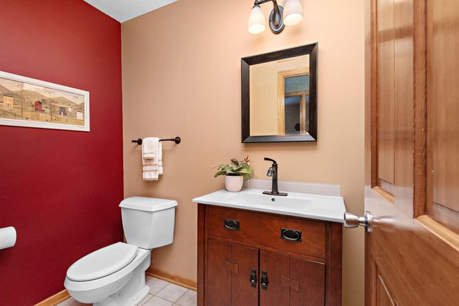 Main level 1/2 bath with updated vanity. | Image 17