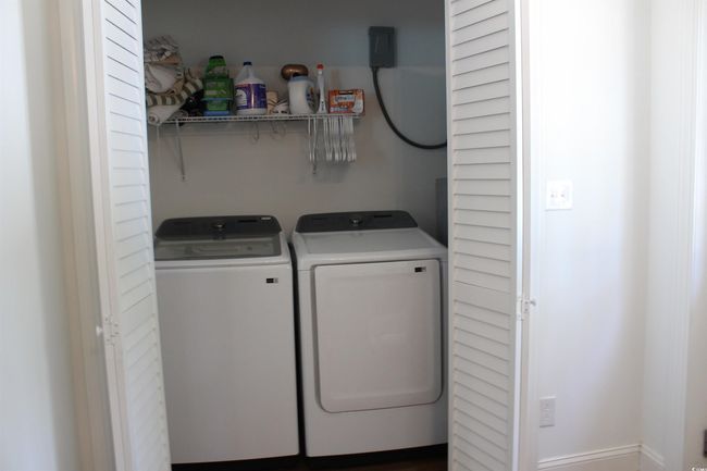 Laundry area with independent washer and dryer | Image 15