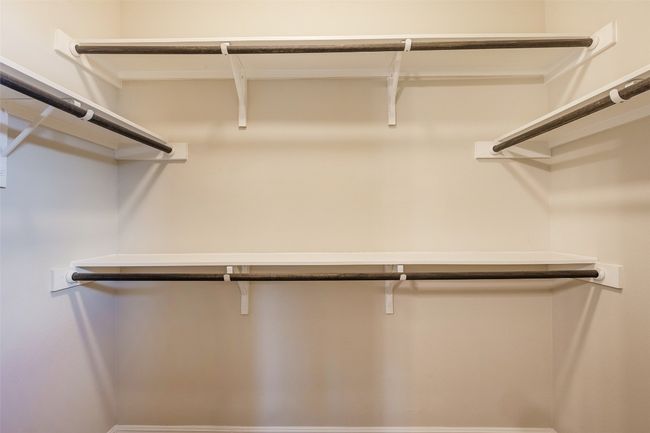 View of spacious closet | Image 29