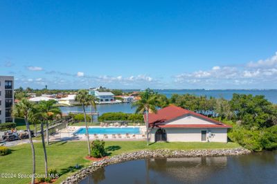 Pool and clubhouse area surrounded by water and wildlife! | Image 2