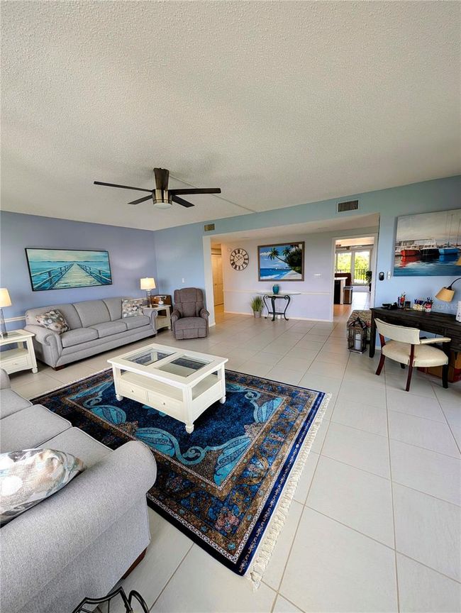 The gorgeous kitchen is open to the family room and is truly the heart of the home! | Image 11