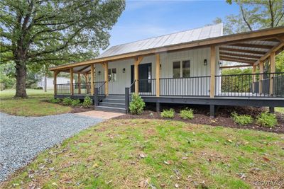 View of front of house featuring a porch and a front lawn | Image 3