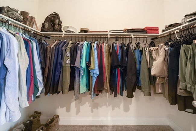 A spacious primary closet. | Image 18