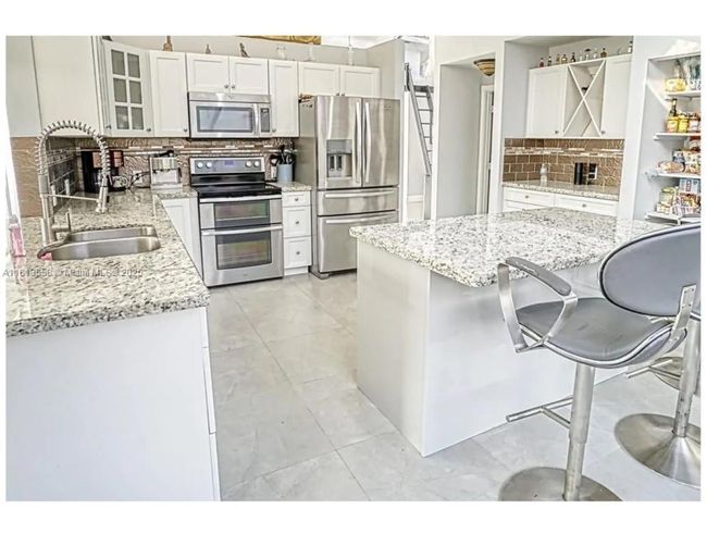 680 111 Th Way, House other with 4 bedrooms, 2 bathrooms and null parking in Coral Springs FL | Image 9