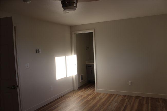 Unfurnished room featuring light wood-type flooring and baseboards | Image 14