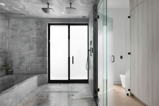 Bathroom with a shower stall and a bath | Image 18