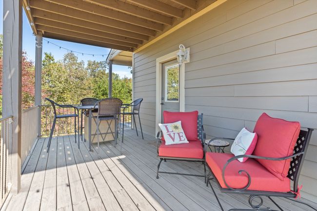 Covered Deck off of KItchen is great outdoor entertaining area. It also has a fabulous view. | Image 22