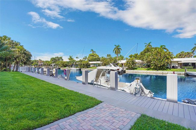 JUST LISTED, A BEACH & BOATERS LOVERS DREAM!!.. PRIVATE DEEDED BEACH ACCESS ACROSS THE STREET AND NEW BOAT DOCK TO LIVE THE LIFESYTLE OF LAUDERDALE BY THE SEA. THIS HIGHLY DEMANDED 2 BEDROOM 2 BATH UNIT FEATURES THE PERFECT LOCATION IN A WELL MANAGED AND FINANCIALLY SOUND COMPLEX WITH ALL CERTIFICATIONS COMPLETED. THE UNIT OFFERS ALOT OF UPDATES, HIGH IMPACT DOORS, WINDOWS, NEWER AC AND HOT WATER HEATER AS WELL AS A NICE SUNROOM OFFERING PLUSH BOTANICAL GARDEN & POOL VIEWS. | Image 14