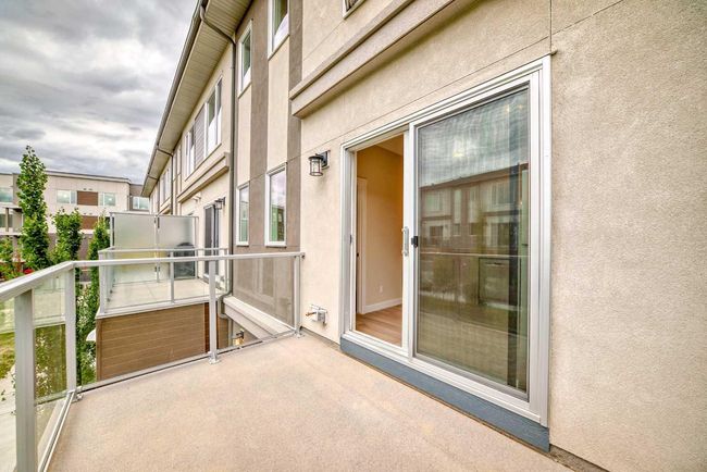 214 Shawnee Square Sw, Townhouse with 2 bedrooms, 3 bathrooms and 3 parking in Calgary AB | Image 21