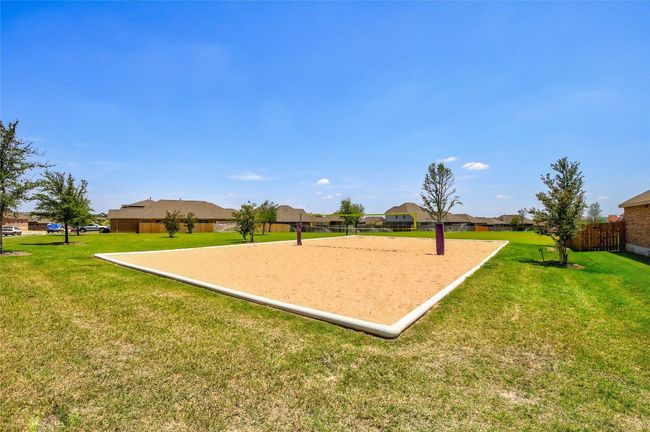 View of community featuring volleyball court | Image 37