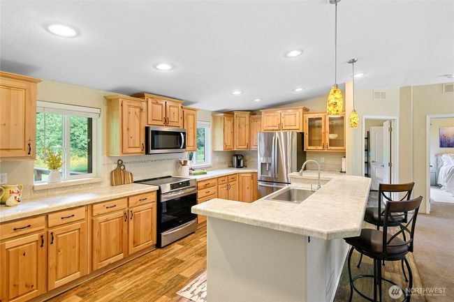 Open kitchen with tons of storage. | Image 7