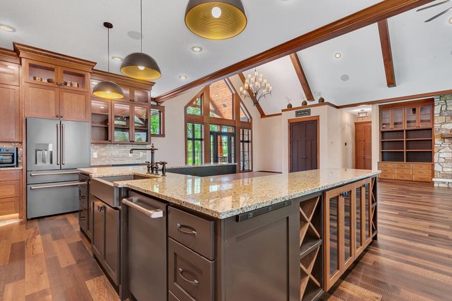 Extra-large center island with ample seating. | Image 38