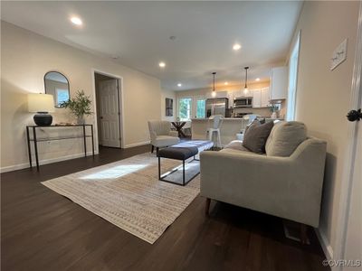 Living room with LVP floors and recessed lighting | Image 2