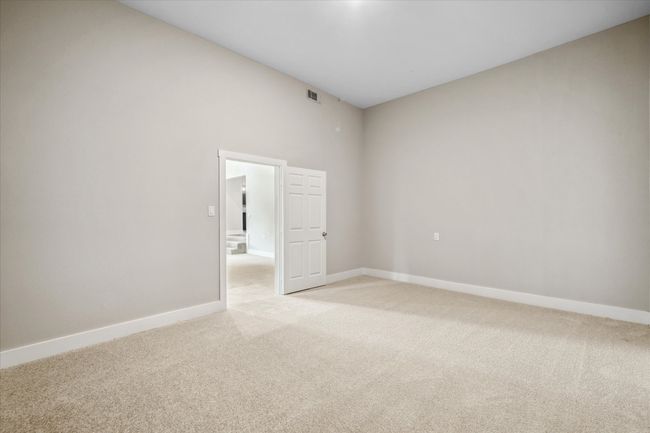 Spare room with light carpet and baseboards | Image 20