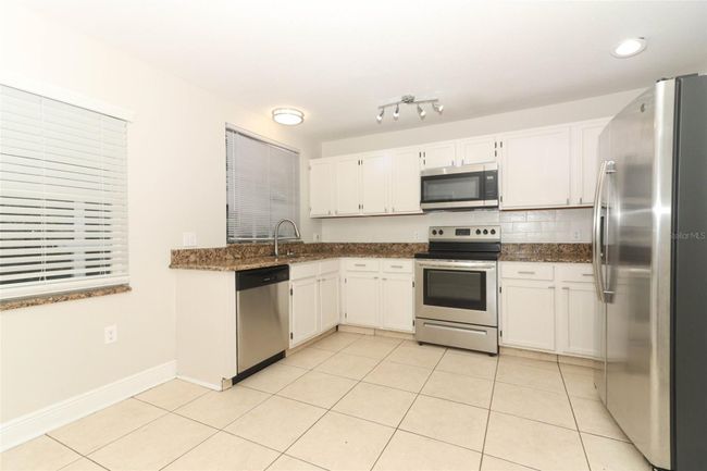 3075 Tall Timber Dr, House other with 4 bedrooms, 3 bathrooms and null parking in Orlando FL | Image 8