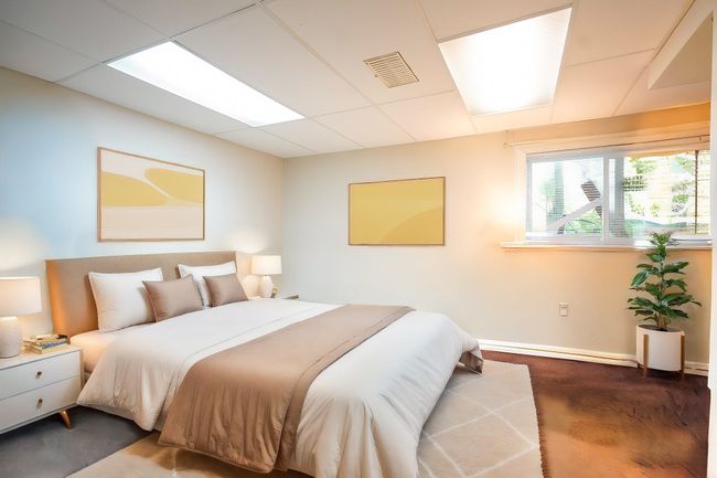 Bedroom with baseboards and a drop ceiling | Image 11