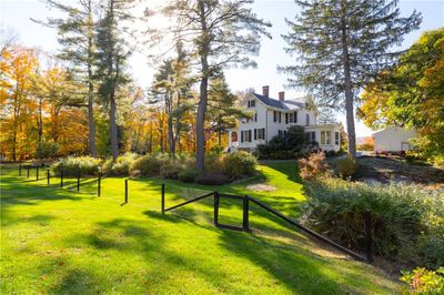 View of community featuring a yard | Image 3