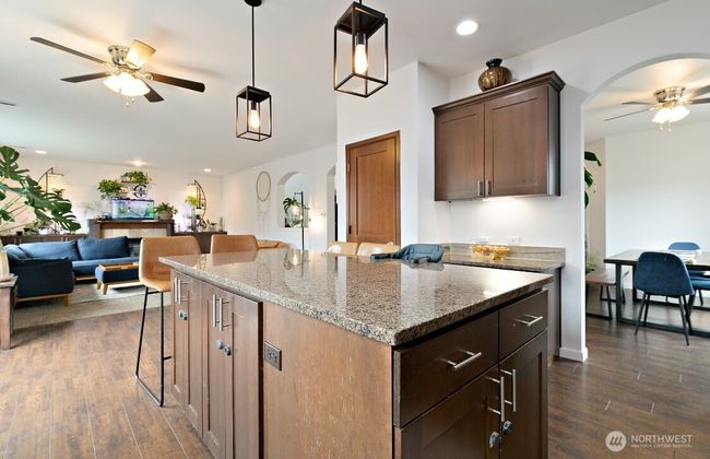 Large Island Breakfast Bar overlooking Great room and dining room. | Image 6