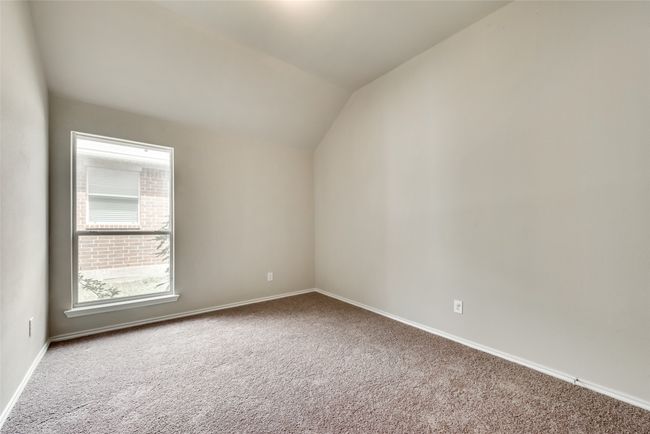 Additional living space with carpet floors and lofted ceiling | Image 29