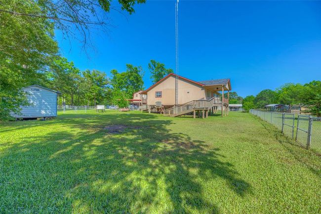 Enjoy your spacious fenced in back yard | Image 19